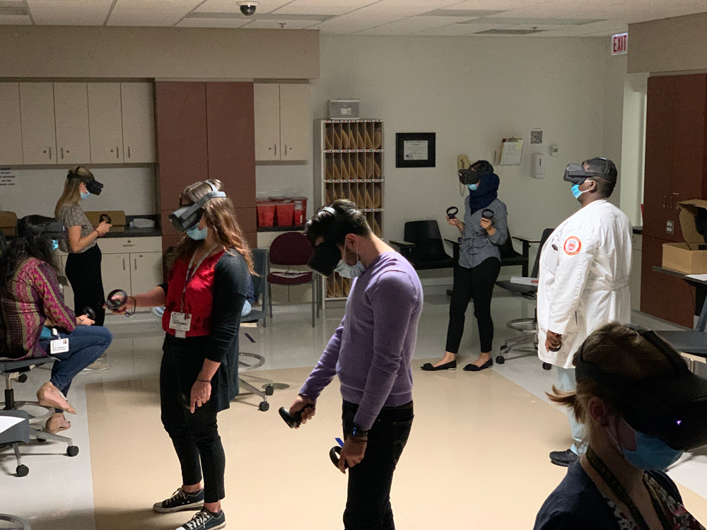 Residents participate in the OcuSim virtual reality training at Loyola University. Source: Anuradha Khanna, MD