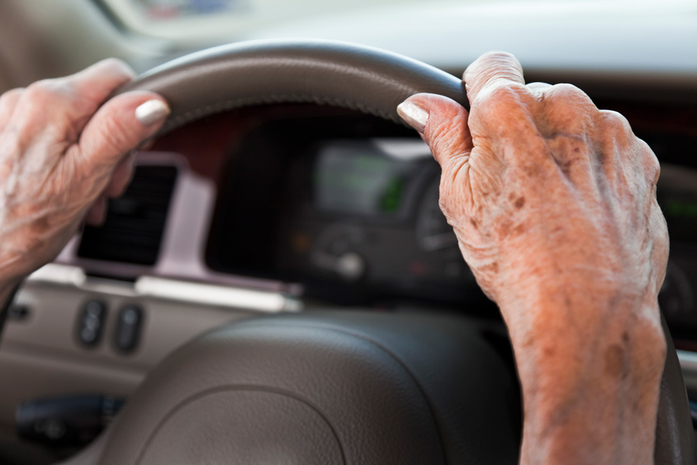 Elderly woman driving